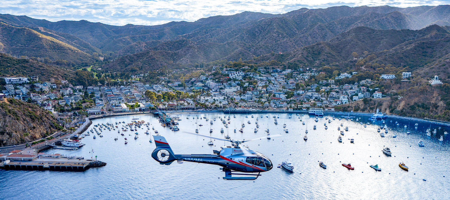 See the boats in Avalon Harbor on Catalina Island, California