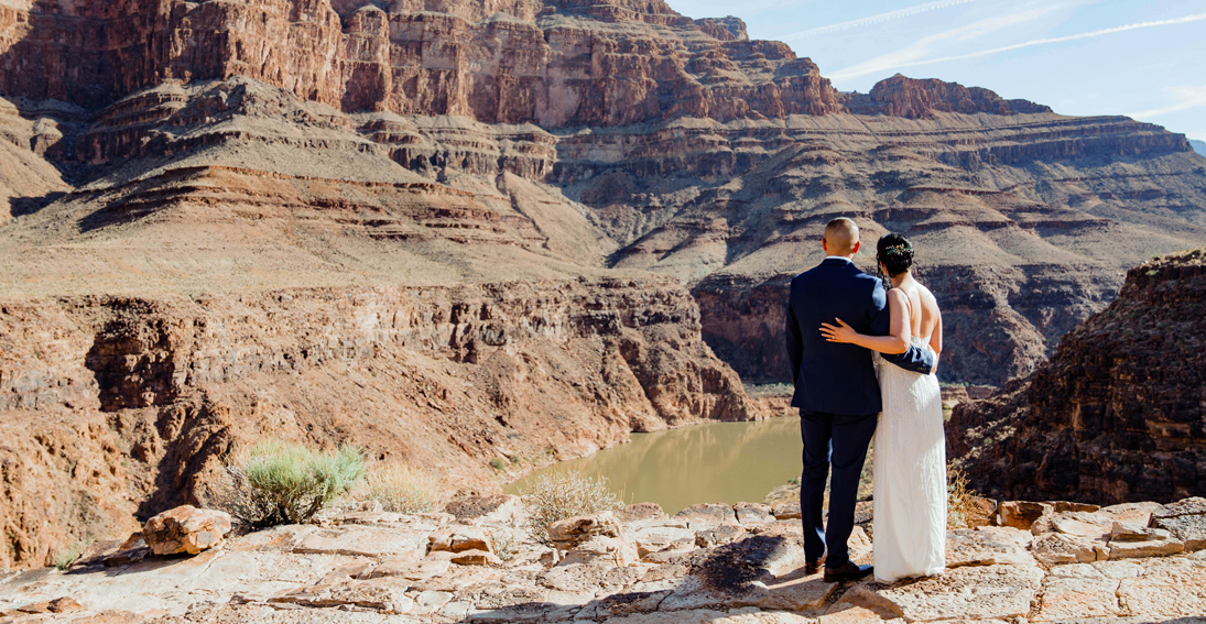 Exclusive Grand Canyon wedding capturing the couple's love on the Colorado River bank