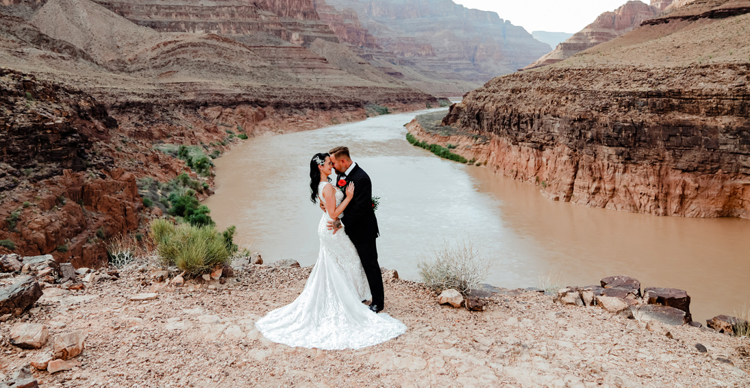 Couple's love shines against the stunning rock formations at their Grand Canyon wedding